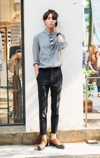 Black Leather Bracelet Outfits For Men: Team a light blue chambray long sleeve shirt with a black leather bracelet for a relaxed take on casual city fashion. On the fence about how to round off your getup? Wear tan leather oxford shoes to elevate it.