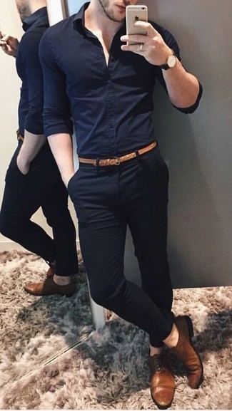 Navy Long Sleeve Shirt Outfits For Men: When the situation allows a casual look, you can opt for a navy long sleeve shirt and black chinos. Finishing off with a pair of brown leather oxford shoes is a simple way to bring a hint of refinement to your getup.