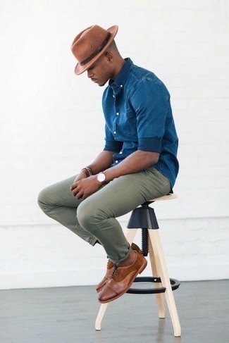 Tobacco Wool Hat Outfits For Men: A blue chambray long sleeve shirt and a tobacco wool hat are veritable essentials if you're crafting a casual closet that holds to the highest menswear standards. And if you wish to immediately up the ante of your outfit with shoes, why not introduce a pair of brown leather oxford shoes to your look?