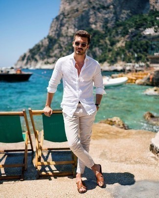 Dark Brown Leather Sandals Outfits For Men: Make a white linen long sleeve shirt and beige chinos your outfit choice for a casual level of dress. Here's how to add a more laid-back vibe to this ensemble: dark brown leather sandals.