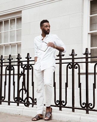 Brown Leather Sandals Outfits For Men: A white long sleeve shirt and white chinos have become a favorite combination for many fashion-forward men. Why not complete your outfit with a pair of brown leather sandals for a more relaxed feel?