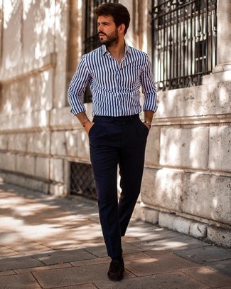 White and Black Vertical Striped Long Sleeve Shirt Outfits For Men: This off-duty pairing of a white and black vertical striped long sleeve shirt and navy chinos will draw attention wherever you go. For a sleeker vibe, introduce dark brown suede tassel loafers to the equation.
