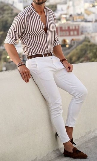 White Vertical Striped Long Sleeve Shirt Outfits For Men: This casual combo of a white vertical striped long sleeve shirt and white chinos comes to rescue when you need to look great in a flash. Puzzled as to how to round off this outfit? Rock a pair of brown suede tassel loafers to amp it up a notch.