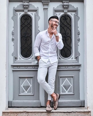Tan Suede Tassel Loafers Outfits: A white long sleeve shirt and white chinos are a pairing that every stylish gentleman should have in his menswear arsenal. Avoid looking too casual by rounding off with a pair of tan suede tassel loafers.
