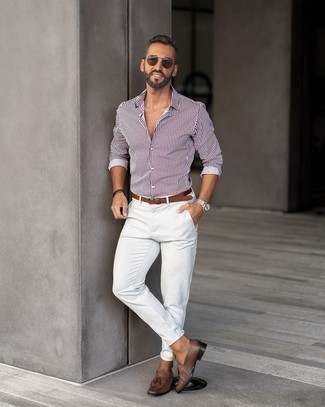 White and Purple Vertical Striped Long Sleeve Shirt Outfits For Men: Consider teaming a white and purple vertical striped long sleeve shirt with white chinos for a functional outfit that's also well put together. Want to go all out with footwear? Complement your outfit with brown leather tassel loafers.