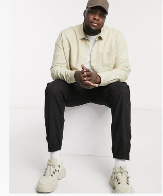 Beige Athletic Shoes Outfits For Men: Try teaming a beige long sleeve shirt with black cargo pants to put together a day-to-day outfit that's full of charm and character. Complete your ensemble with beige athletic shoes to infuse an element of stylish nonchalance into this getup.