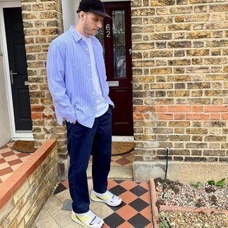 Black Baseball Cap Outfits For Men: Make a light blue vertical striped long sleeve shirt and a black baseball cap your outfit choice for a relaxed ensemble. If you need to effortlessly smarten up your look with a pair of shoes, why not introduce white athletic shoes to the equation?