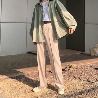 Olive Long Sleeve Shirt Outfits For Men: If you're a fan of laid-back combos, then you'll like this combination of an olive long sleeve shirt and pink chinos. Beige canvas low top sneakers are guaranteed to give an air of stylish nonchalance to this look.