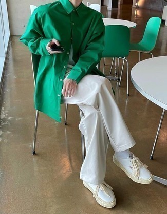 Green Long Sleeve Shirt Outfits For Men: This laid-back combination of a green long sleeve shirt and white chinos is a winning option when you need to look sharp but have zero time. And if you wish to effortlessly play down your ensemble with shoes, why not add white canvas low top sneakers to the mix?