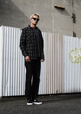 Slip-on Sneakers Outfits For Men: A black plaid flannel long sleeve shirt and black chinos are the perfect way to inject extra cool into your off-duty styling lineup. Slip-on sneakers act as the glue that pulls your ensemble together.
