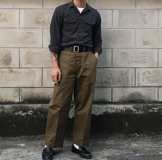 Brown Chinos Outfits: This combination of a charcoal long sleeve shirt and brown chinos is proof that a safe casual outfit can still be really interesting. A pair of black leather loafers effortlessly classes up the outfit.