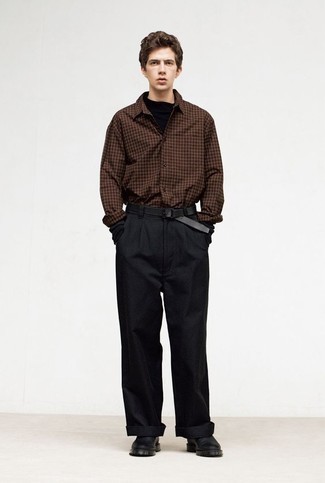 Black Chinos Outfits: This is hard proof that a dark brown gingham long sleeve shirt and black chinos look amazing when paired together in an off-duty getup. Add a pair of black leather chelsea boots to your ensemble to jazz things up.