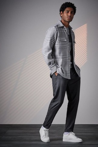 Grey Houndstooth Wool Long Sleeve Shirt Outfits For Men: If you feel more confident in functional clothes, you'll appreciate this casual combo of a grey houndstooth wool long sleeve shirt and charcoal chinos. Now all you need is a pair of white canvas low top sneakers to finish this ensemble.