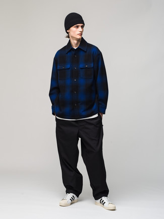 Men's Navy Plaid Flannel Long Sleeve Shirt, White Crew-neck T-shirt, Black Chinos, White and Black Leather Low Top Sneakers