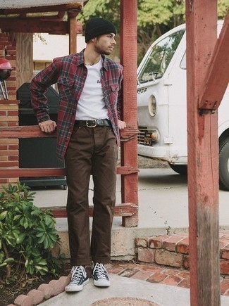 Olive Leather Belt Outfits For Men: A red plaid flannel long sleeve shirt looks so great when paired with an olive leather belt in a casual outfit. Jazz up your outfit by slipping into black and white canvas high top sneakers.