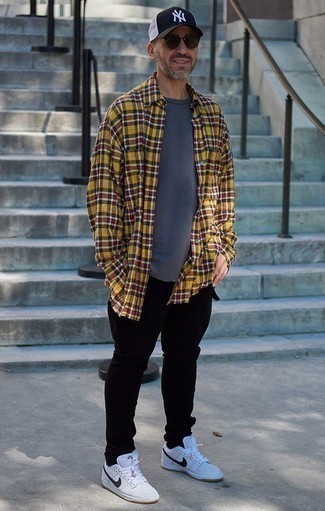 Men's Mustard Plaid Long Sleeve Shirt, Navy Crew-neck T-shirt, Black Chinos, White and Black Low Top Sneakers