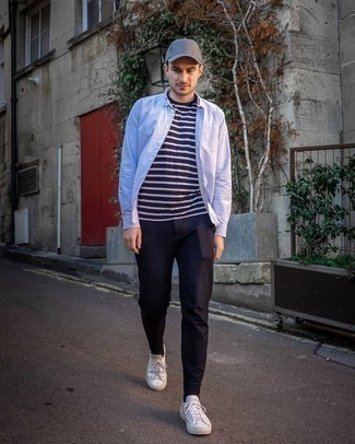Navy Horizontal Striped Crew-neck T-shirt Outfits For Men: Team a navy horizontal striped crew-neck t-shirt with navy chinos for relaxed dressing with a modern finish. Add a pair of white canvas low top sneakers to the equation and you're all done and looking amazing.