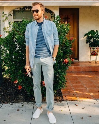 Light Blue Chinos Outfits: This pairing of a light blue chambray long sleeve shirt and light blue chinos combines comfort and functionality and helps you keep it clean yet modern. A pair of white canvas slip-on sneakers looks perfect here.