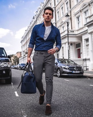 Navy Canvas Holdall Outfits For Men: The mix-and-match capabilities of a navy chambray long sleeve shirt and a navy canvas holdall ensure you'll always have them on constant rotation. A pair of dark brown suede double monks will bring a different twist to an otherwise mostly casual ensemble.