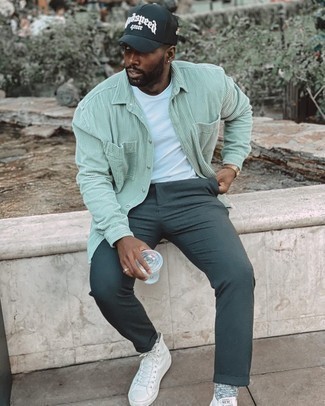 Mint Long Sleeve Shirt Outfits For Men: This combo of a mint long sleeve shirt and dark green chinos is a cool menswear style for when it's time to clock off. For times when this getup is just too much, dial it down by wearing a pair of white canvas high top sneakers.