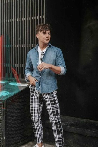 Black Plaid Chinos Outfits: The formula for casual style? A light blue chambray long sleeve shirt with black plaid chinos. Complete this getup with white canvas low top sneakers for maximum effect.