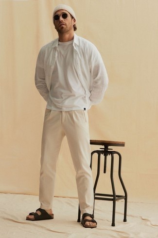 Dark Brown Leather Sandals Outfits For Men: This pairing of a white linen long sleeve shirt and beige chinos is super easy to pull together and so comfortable to wear a variation of as well! Add a pair of dark brown leather sandals to the mix to immediately boost the appeal of your look.