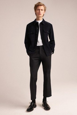 Black Corduroy Long Sleeve Shirt Outfits For Men: A black corduroy long sleeve shirt and black chinos are the kind of a tested off-duty ensemble that you so desperately need when you have zero time. Our favorite of a great number of ways to finish off this ensemble is with a pair of black leather derby shoes.