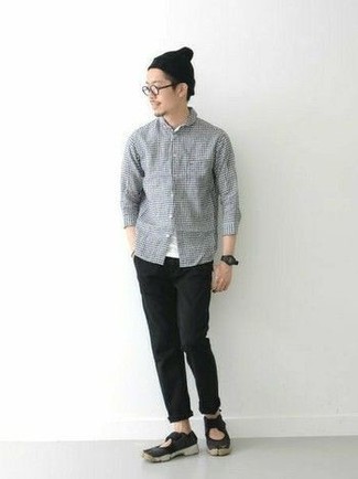 White and Black Gingham Long Sleeve Shirt Outfits For Men: A white and black gingham long sleeve shirt and black chinos are the kind of a tested casual combo that you need when you have zero time to spare. Go off the beaten track and switch up your ensemble by finishing off with a pair of black canvas sandals.