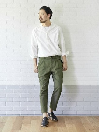 Olive Canvas Belt Outfits For Men: Consider wearing a white long sleeve shirt and an olive canvas belt to assemble a street style and absolutely dapper ensemble. Rounding off with a pair of black leather sandals is a guaranteed way to inject a hint of stylish nonchalance into this outfit.