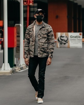 Tan Canvas Low Top Sneakers Outfits For Men: Such staples as a grey camouflage long sleeve shirt and black chinos are an easy way to introduce toned down dapperness into your current styling collection. When it comes to footwear, round off with tan canvas low top sneakers.