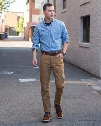 Dark Brown Suede Casual Boots Outfits For Men: Sharp yet comfy, this ensemble is assembled from a light blue chambray long sleeve shirt and khaki chinos. For a classier vibe, introduce dark brown suede casual boots to the mix.