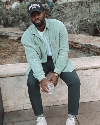 High Top Sneakers Outfits For Men: For an ensemble that provides comfort and fashion, rock a mint corduroy long sleeve shirt with dark green chinos. Send an otherwise classic outfit in a less formal direction by finishing off with a pair of high top sneakers.