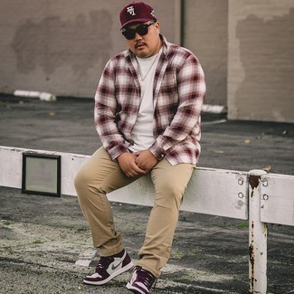 Burgundy Plaid Long Sleeve Shirt Outfits For Men: A burgundy plaid long sleeve shirt and khaki chinos are a go-to pairing for many sartorially savvy gents. Give a playful touch to your outfit by rounding off with dark purple leather high top sneakers.