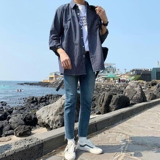 Grey Gingham Long Sleeve Shirt Outfits For Men: This pairing of a grey gingham long sleeve shirt and blue jeans looks well-executed and makes any guy look instantly cooler. On the footwear front, this look is finished off wonderfully with white and navy canvas low top sneakers.