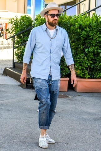 Light Blue Sneakers Outfits For Men: This casual street style combo of a light blue vertical striped long sleeve shirt and blue ripped jeans is very versatile and up for whatever adventure you may find yourself on. Finishing off with a pair of light blue sneakers is an effortless way to inject a more laid-back spin into your ensemble.
