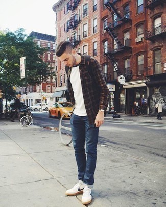 Men's Dark Brown Plaid Long Sleeve Shirt, White Crew-neck T-shirt, Navy Jeans, White and Navy Leather Low Top Sneakers