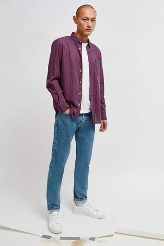 Red and Navy Check Long Sleeve Shirt Outfits For Men: For a laid-back look, try pairing a red and navy check long sleeve shirt with blue jeans — these two items go nicely together. If you don't know how to finish off, a pair of white leather low top sneakers is a savvy choice.