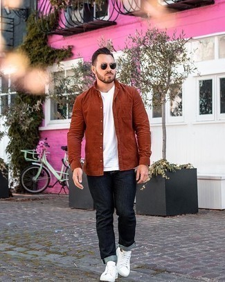 Tobacco Long Sleeve Shirt Outfits For Men: Super dapper, this relaxed casual combo of a tobacco long sleeve shirt and navy jeans will provide you with variety. For maximum style, complement this outfit with white canvas low top sneakers.