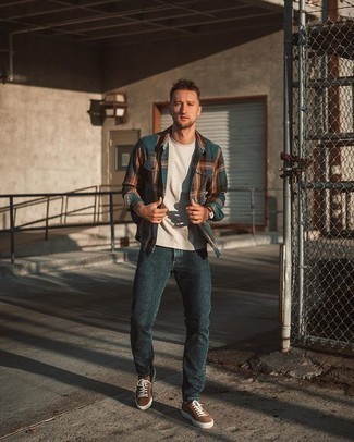 Dark Brown Canvas Low Top Sneakers Outfits For Men: Opt for a dark green plaid long sleeve shirt and navy jeans for a daily ensemble that's full of charisma and character. If in doubt about the footwear, throw a pair of dark brown canvas low top sneakers into the mix.