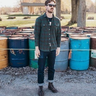 Dark Green Long Sleeve Shirt Outfits For Men: Consider pairing a dark green long sleeve shirt with navy jeans for a comfy ensemble that's also put together. Tap into some Idris Elba dapperness and class up your look with dark brown leather casual boots.