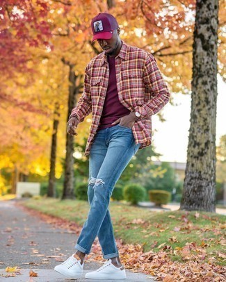 Burgundy Print Baseball Cap Outfits For Men: Consider teaming a multi colored plaid long sleeve shirt with a burgundy print baseball cap for comfort dressing with an urban spin. Boost the dressiness of this look a bit with white leather low top sneakers.