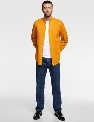 Orange Long Sleeve Shirt Outfits For Men: To create a laid-back ensemble with a clear fashion twist, reach for an orange long sleeve shirt and navy jeans. Spruce up this outfit with black leather loafers.