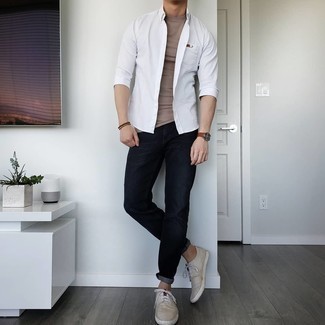 White Long Sleeve Shirt Outfits For Men: A white long sleeve shirt and black jeans? It's easily a wearable look that anyone could sport on a day-to-day basis. Beige canvas low top sneakers integrate nicely within a great deal of getups.