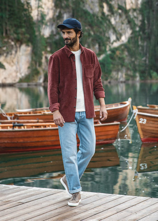 Burgundy Shirt Summer Outfits For Men: A burgundy shirt and light blue jeans are a combo that every trendsetting guy should have in his closet. To give your overall look a smarter feel, why not complete this getup with a pair of brown leather low top sneakers? No doubt, you're looking at a good choice for a hot day.