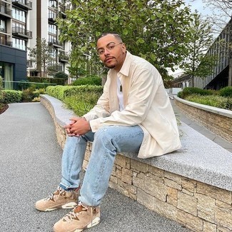 Tan Suede High Top Sneakers Outfits For Men: Consider wearing a beige long sleeve shirt and light blue ripped jeans and you'll be ready for wherever the day takes you. When in doubt as to what to wear in the footwear department, stick to tan suede high top sneakers.