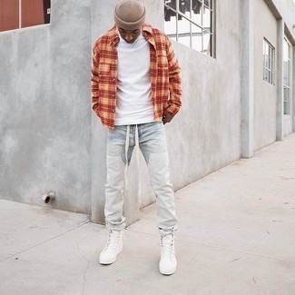 Light Blue Patchwork Jeans Outfits For Men: We're loving how an orange plaid long sleeve shirt teams with light blue patchwork jeans. Add a more casual twist to an otherwise all-too-safe outfit by rocking a pair of white canvas high top sneakers.