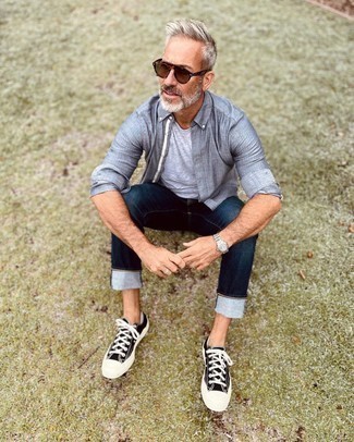 White No Show Socks Outfits For Men: Dress in a grey chambray long sleeve shirt and white no show socks to effortlessly deal with whatever this day throws at you. A pair of black and white canvas low top sneakers will put a different spin on an otherwise standard look.