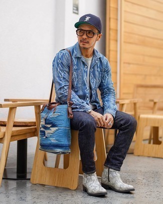 Blue Print Canvas Tote Bag Outfits For Men: A blue print chambray long sleeve shirt and a blue print canvas tote bag worn together are a savvy match. To bring out an elegant side of you, add a pair of grey leather chelsea boots to the mix.