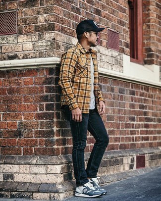Men's Tobacco Plaid Flannel Long Sleeve Shirt, Grey Crew-neck T-shirt, Black Jeans, White and Navy Athletic Shoes
