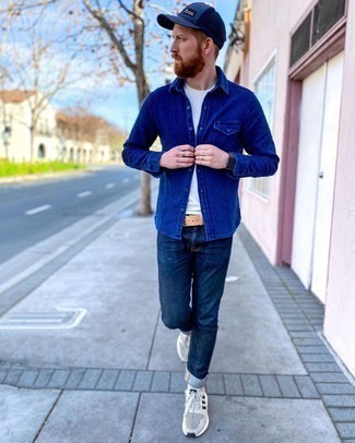 Charcoal Athletic Shoes Outfits For Men: If it's ease and practicality that you're looking for in menswear, opt for a navy long sleeve shirt and navy jeans. And if you want to effortlessly tone down your ensemble with one single piece, complement this outfit with charcoal athletic shoes.